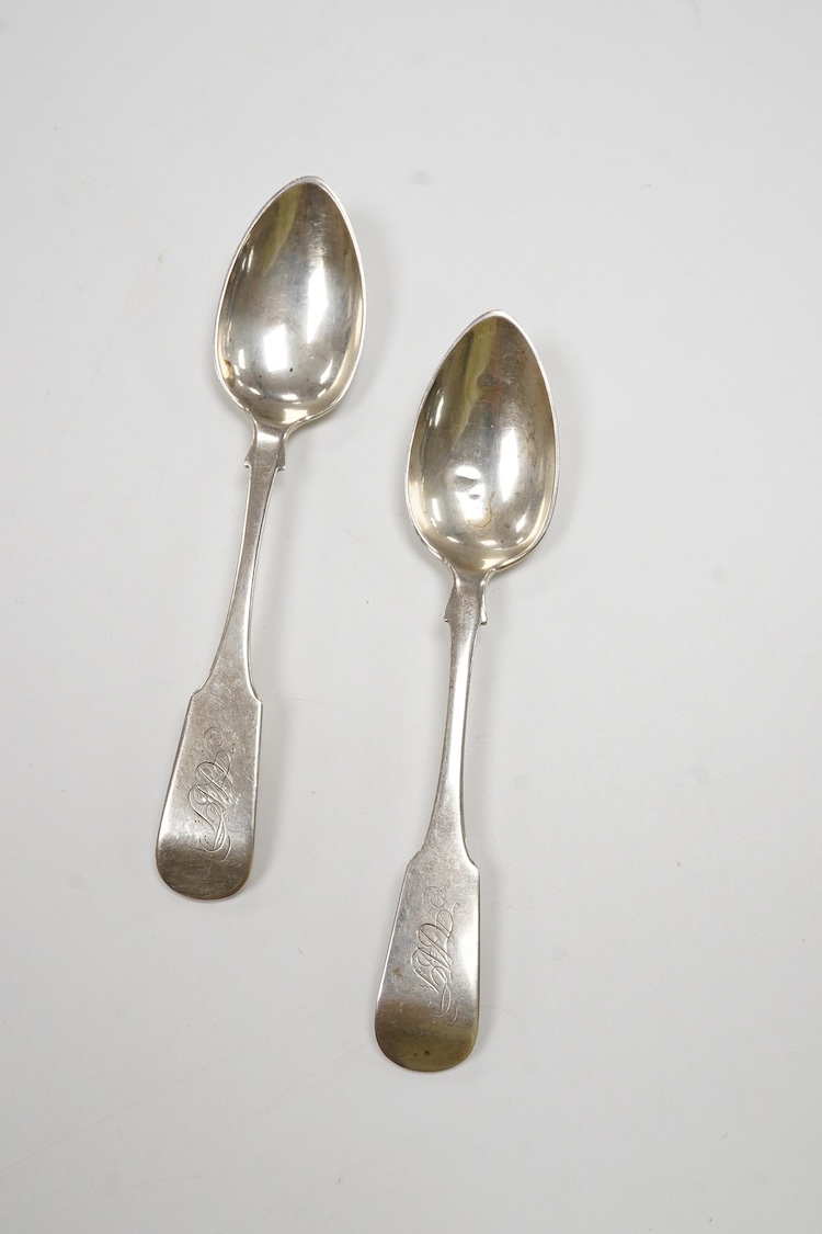 A pair of mid 19th century Canadian white metal fiddle pattern teaspoons, with pseudo hallmarks, maker probably William Norris Venning of Saint John, New Brunswick, circa 1850-1870, with engraved initials, 14.5cm, 39 gra